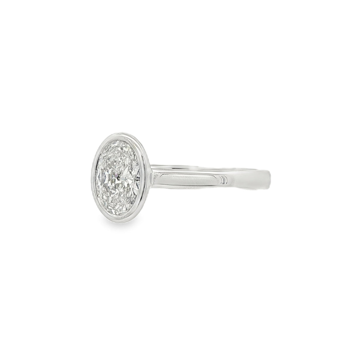Oval Cut 1.01ct Rub Over Diamond, Platinum Ring